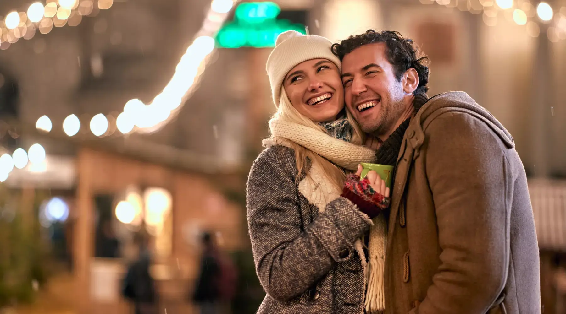 A couple at a Christmas market
