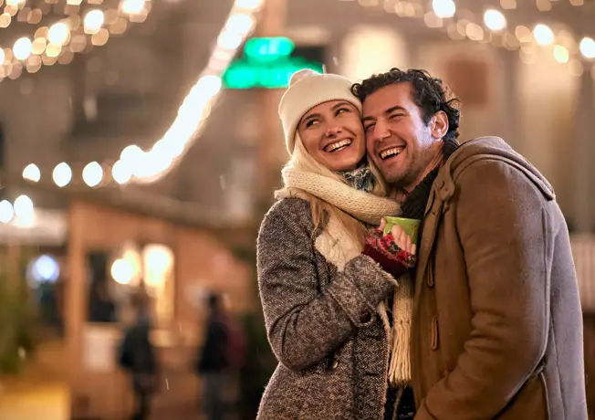 A couple at a Christmas market