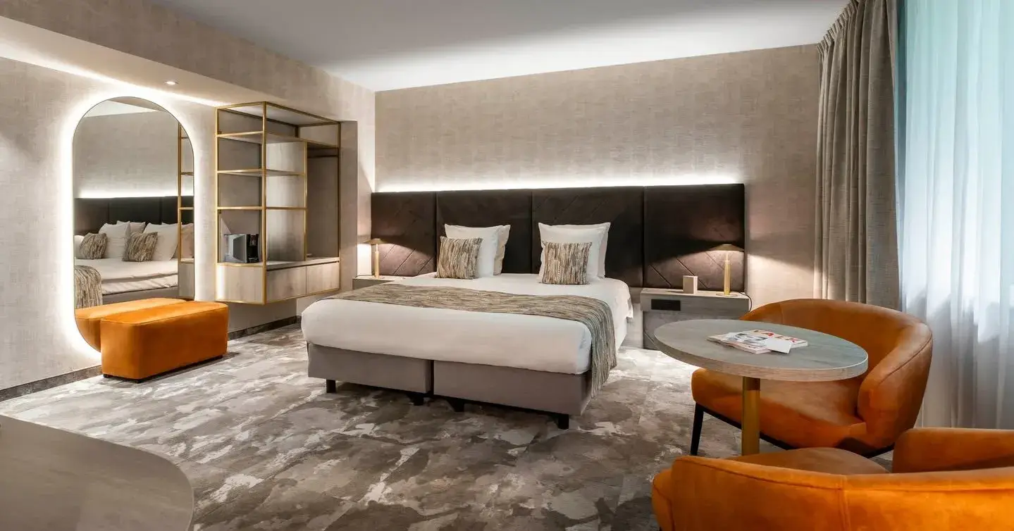 Chambre d'hôtel moderne et spacieuse avec finitions haut de gamme au Van der Valk Hôtel Waterloo.