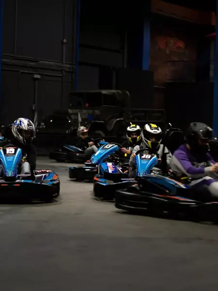 Santa Claus in bed with a remote control.