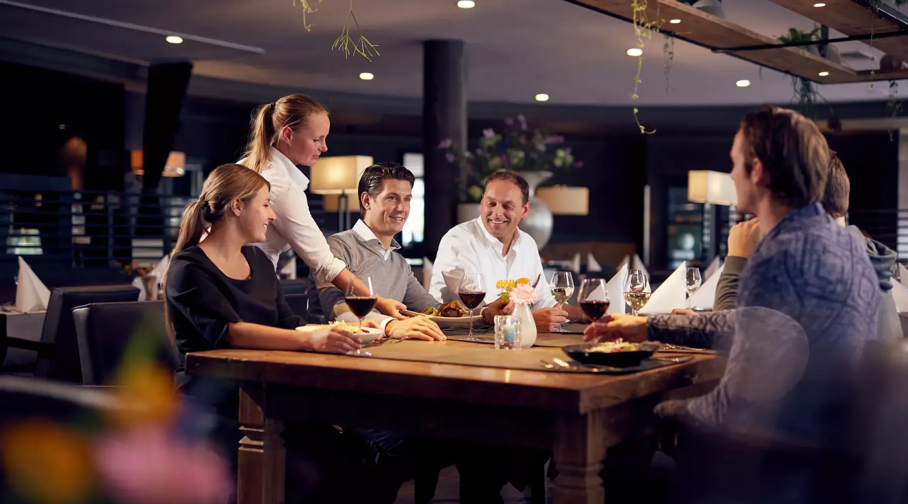 Business dinner in a restaurant setting.