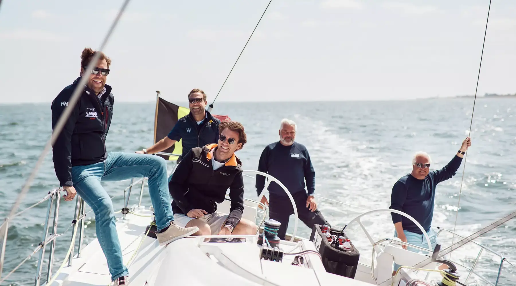 Crew on a sailboat