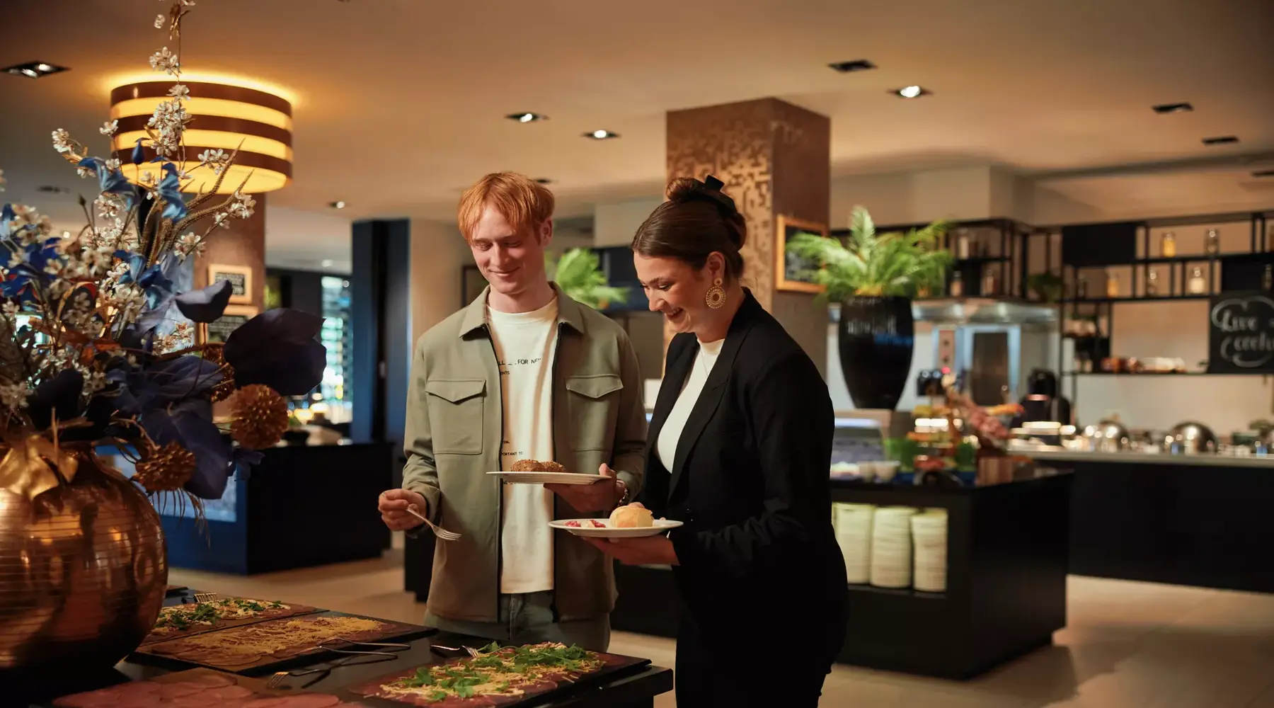Man and woman enjoying an Easter buffet