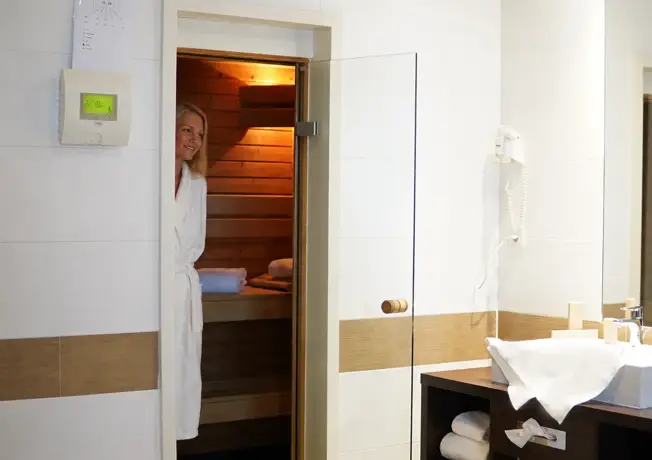 Nuit en amoureux avec sauna  Suite avec Sauna Privé à Charleroi | Expérience Wellness
