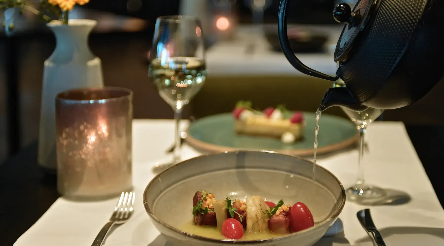 Waiter sets a table.