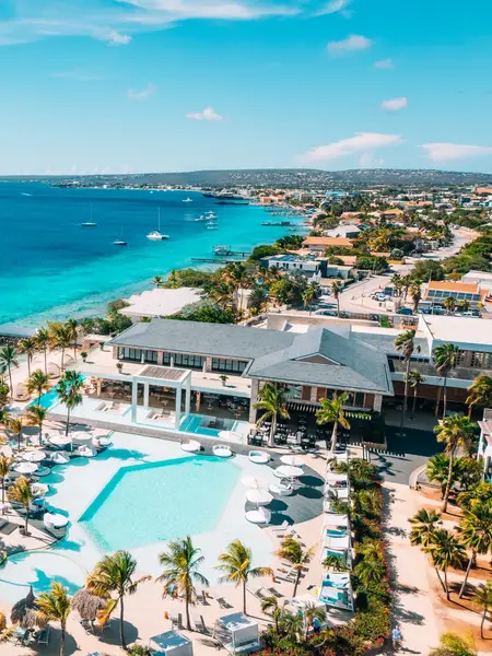 Plaza Resort Bonaire from above, by the azure blue sea