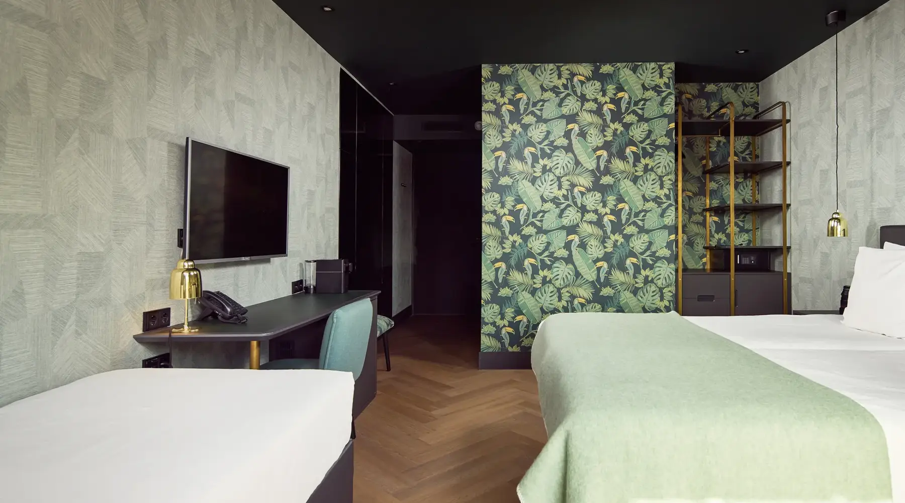 Comfort room with three beds