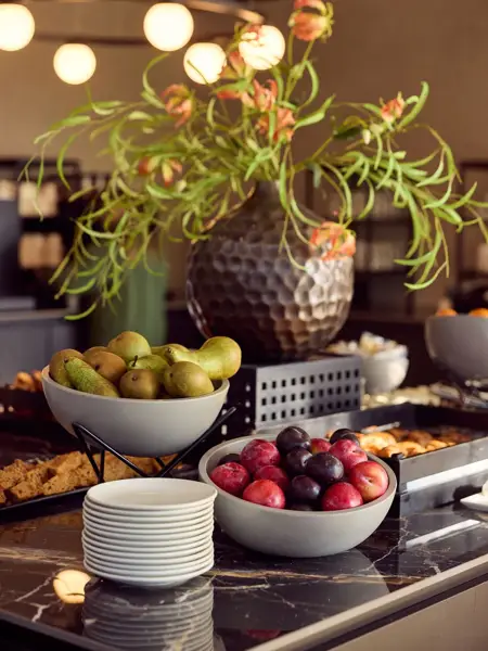 Fruit, snacks, and drinks on the buffet for meeting guests in Hotel Ghent