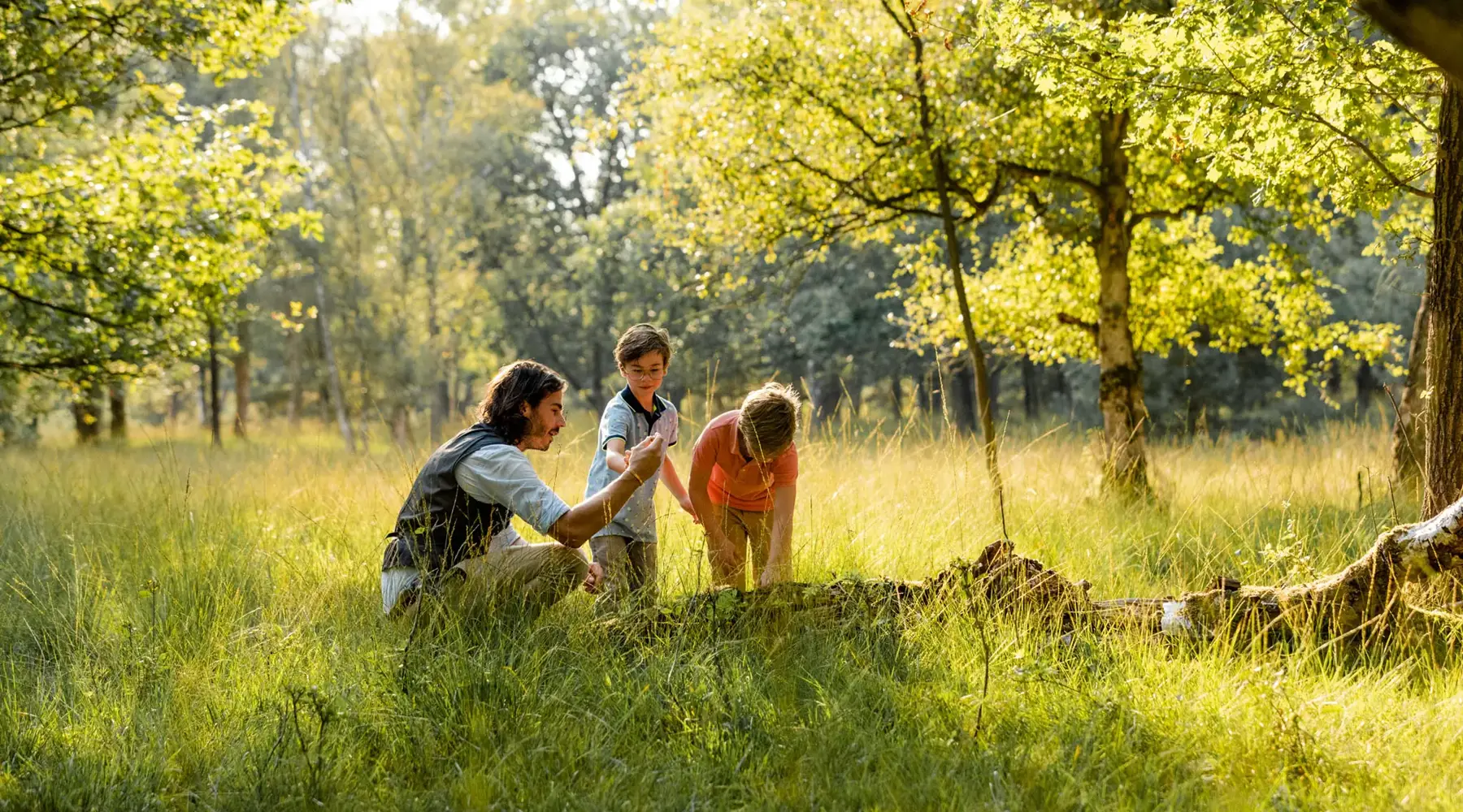 Father with children in nature