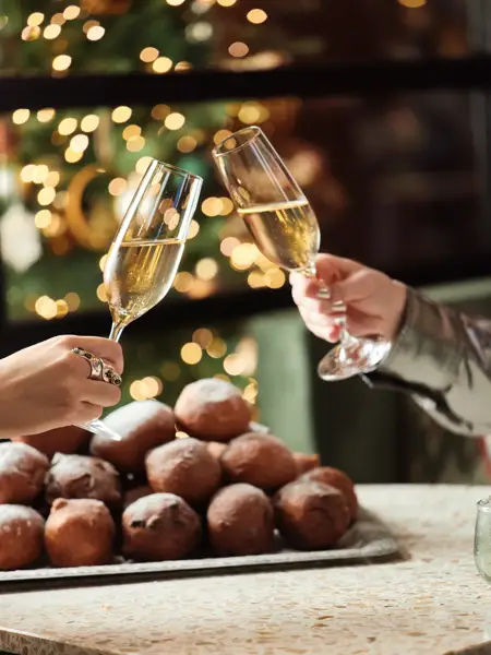 New Year's reception with champagne and oliebollen