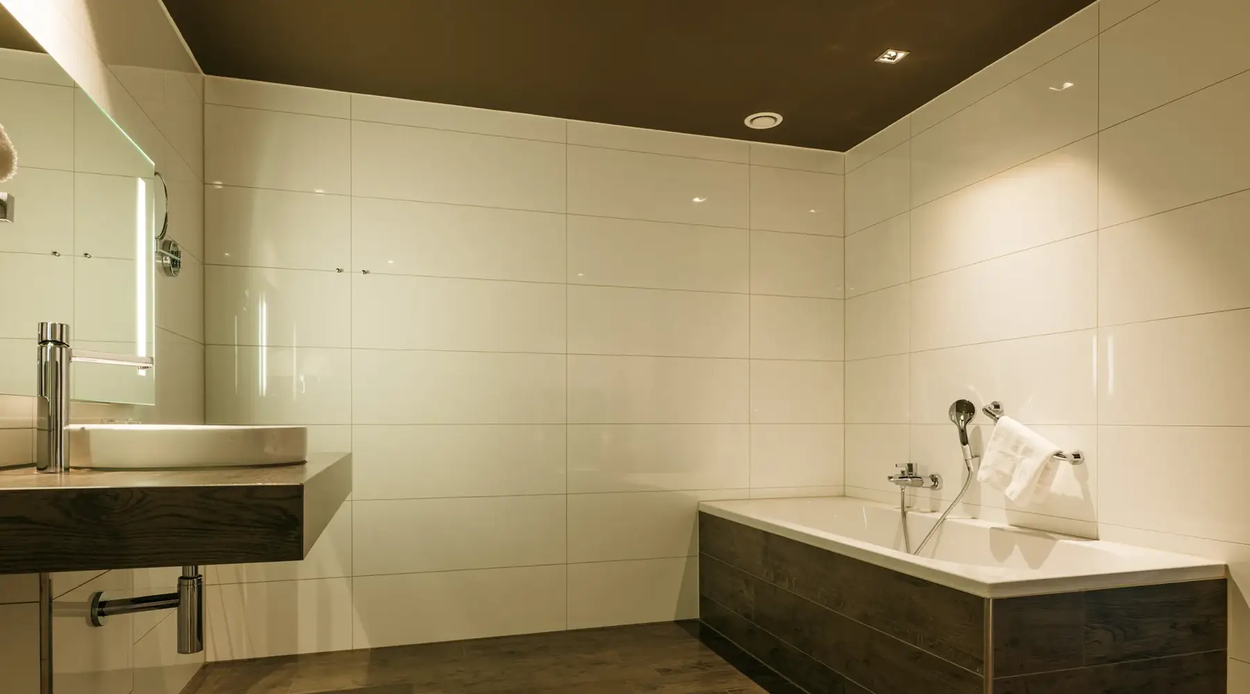 Accessible comfort room with bathtub & shower.