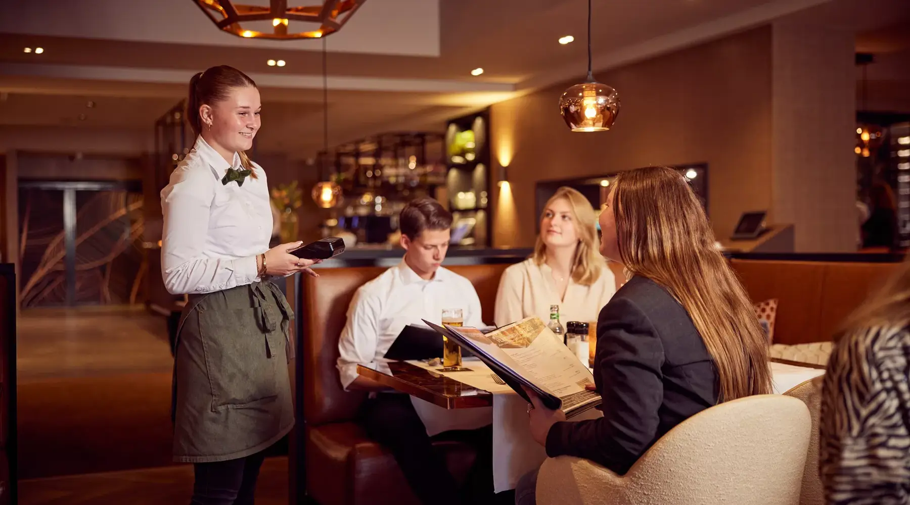 People at a table in a restaurant