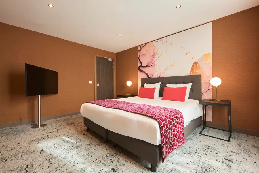 Une chambre familiale élégante et lumineuse de l’Hôtel Sélys Liège, idéale pour un séjour en famille dans un hôtel 4 étoiles.