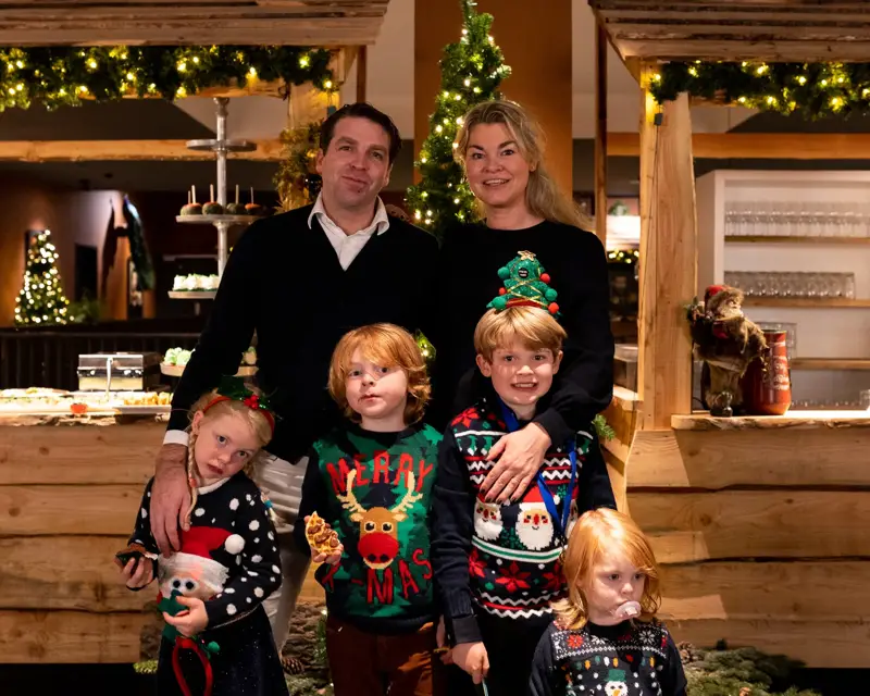 The family in the Christmas atmosphere