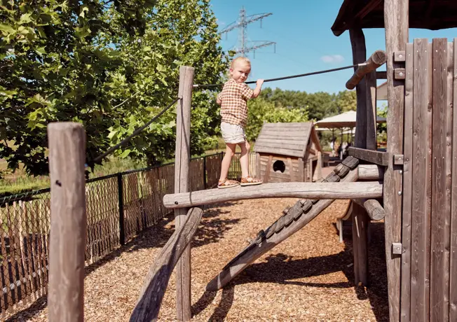 Girl on a climbing frame