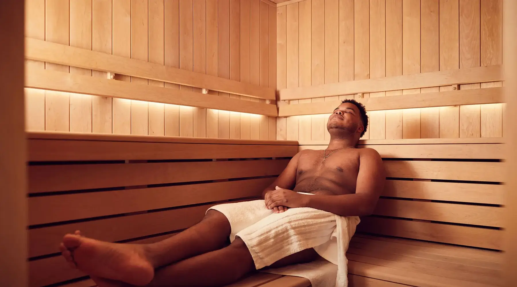 Man relaxing in the sauna 