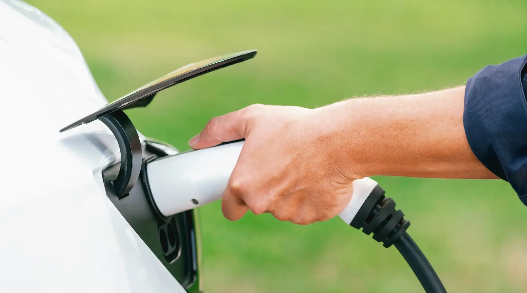 Free parking with charging stations for electric vehicles in Waterloo.