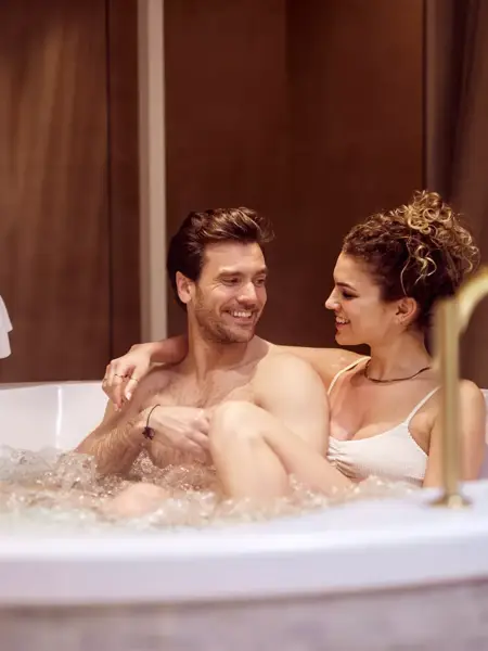 Couple is together in a whirlpool