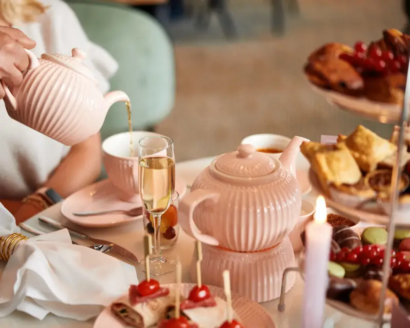 A dressed table with a high tea