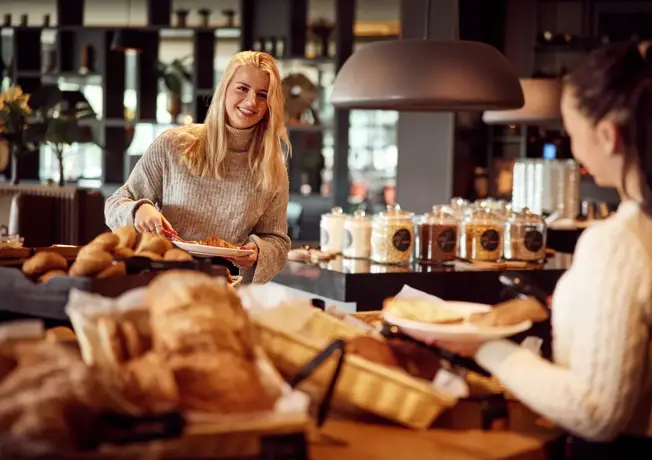 Two women at the buffet