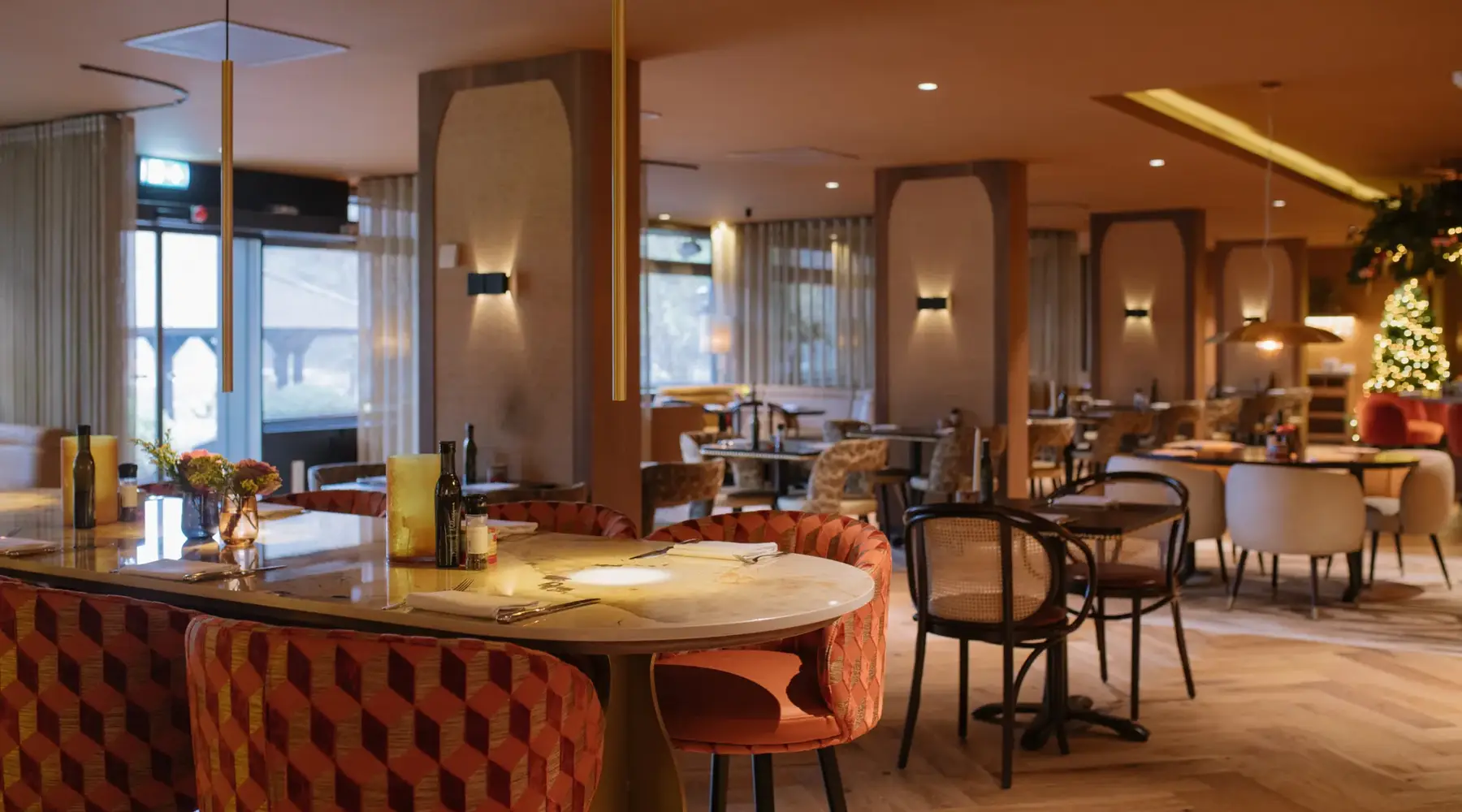 Atmospheric restaurant with set tables