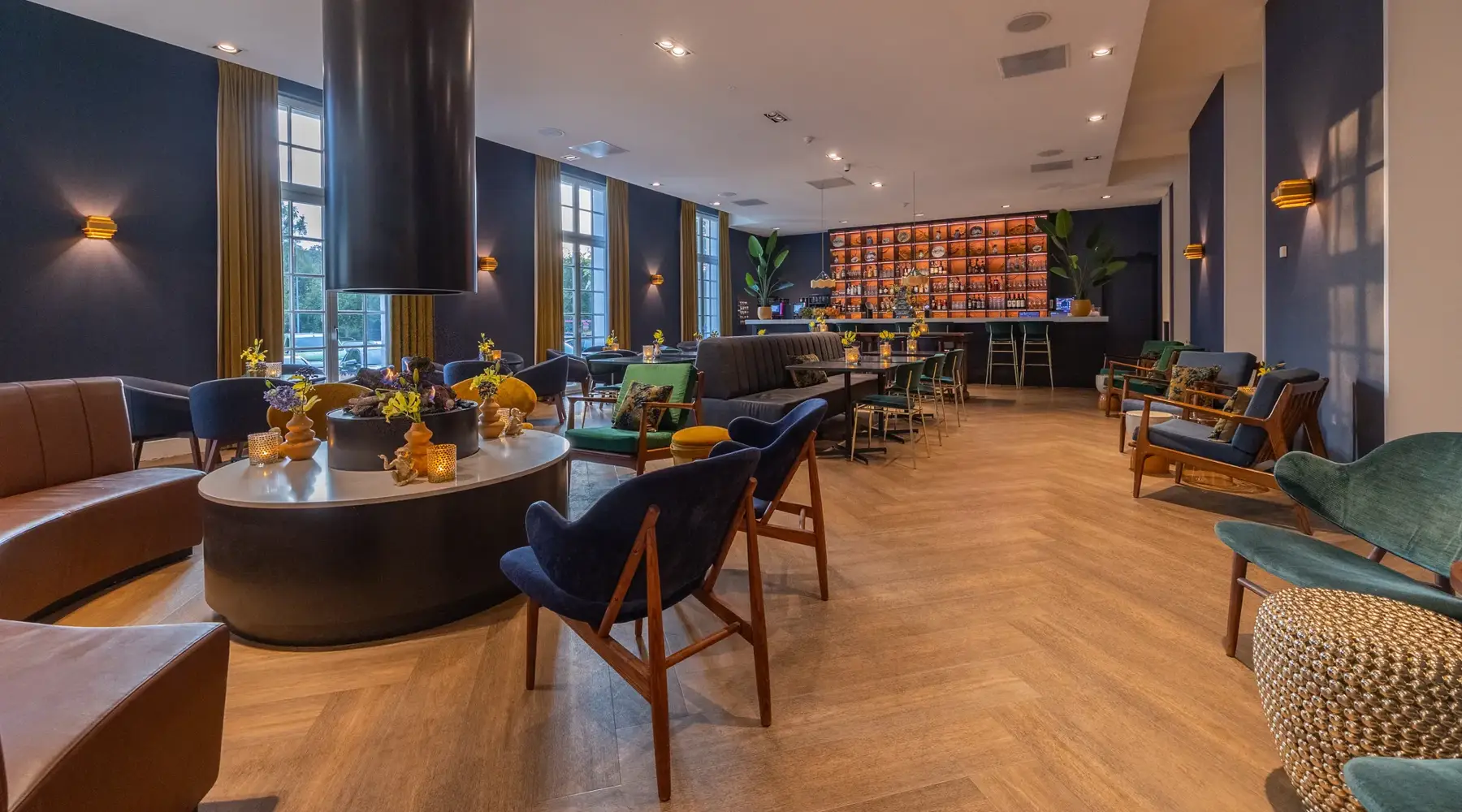The bar with chairs and benches.