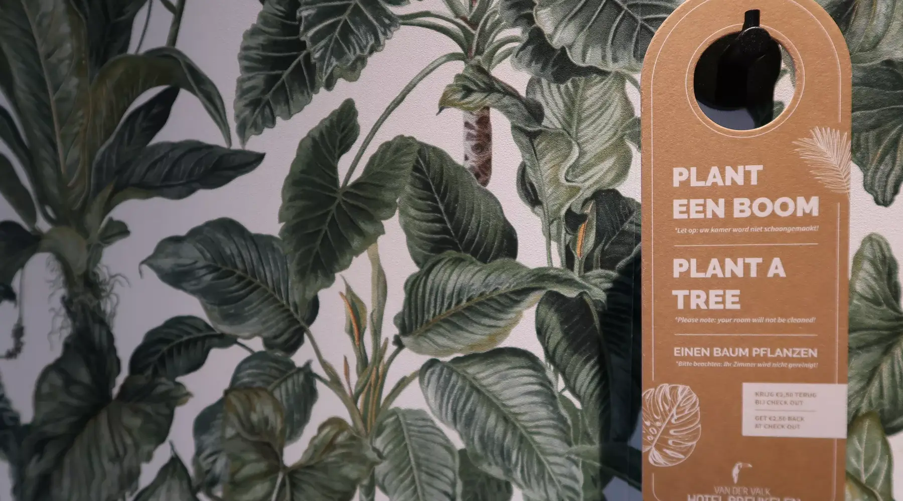 A door hanger about Hotels for Trees