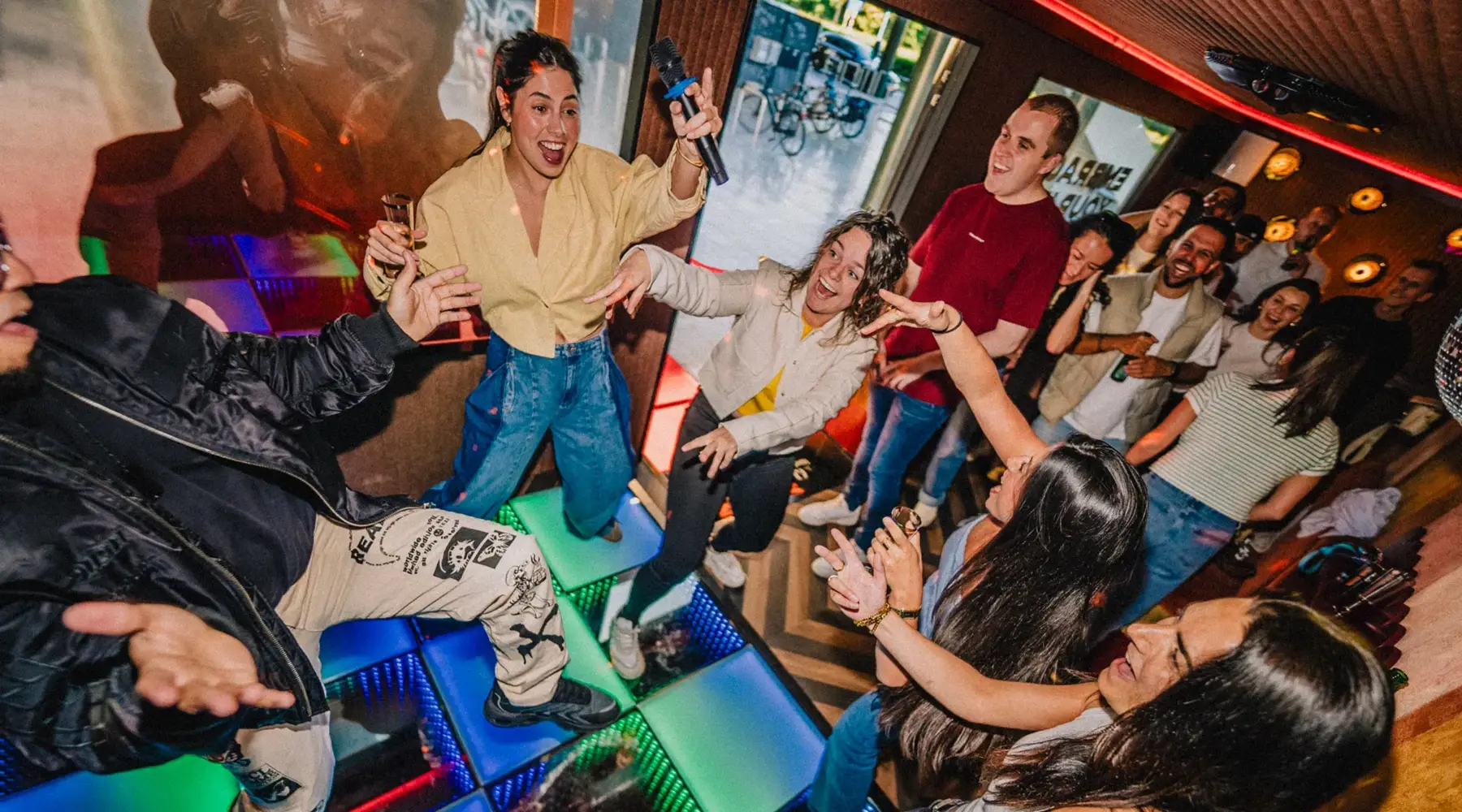 Singing people in the karaoke bus