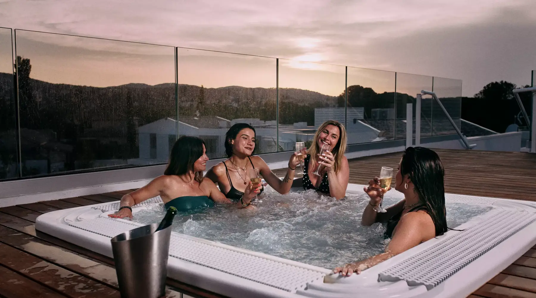 Friends in the hot tub on the rooftop of Hotel Bloom.