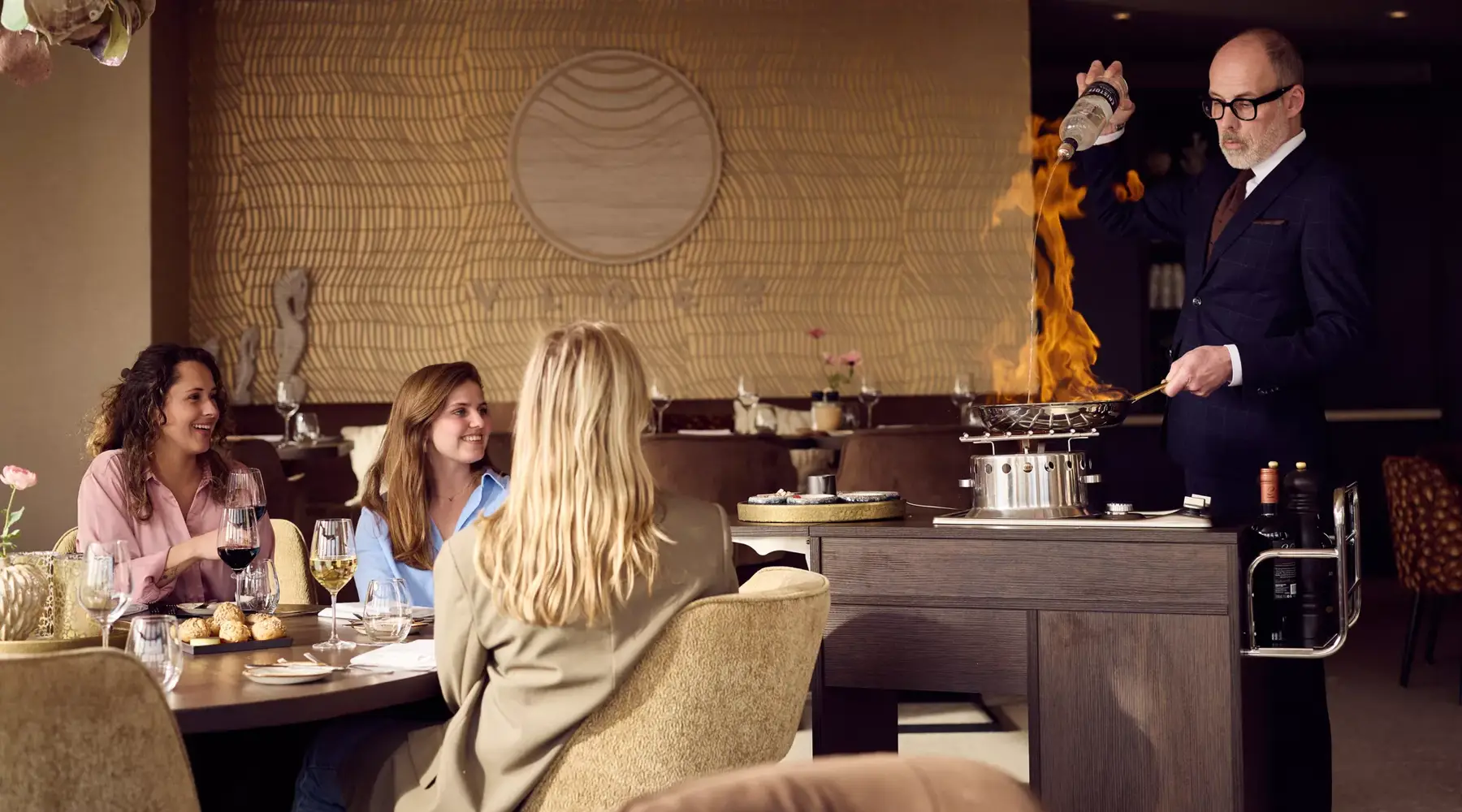 Dish is flambéed in a Van der Valk restaurant