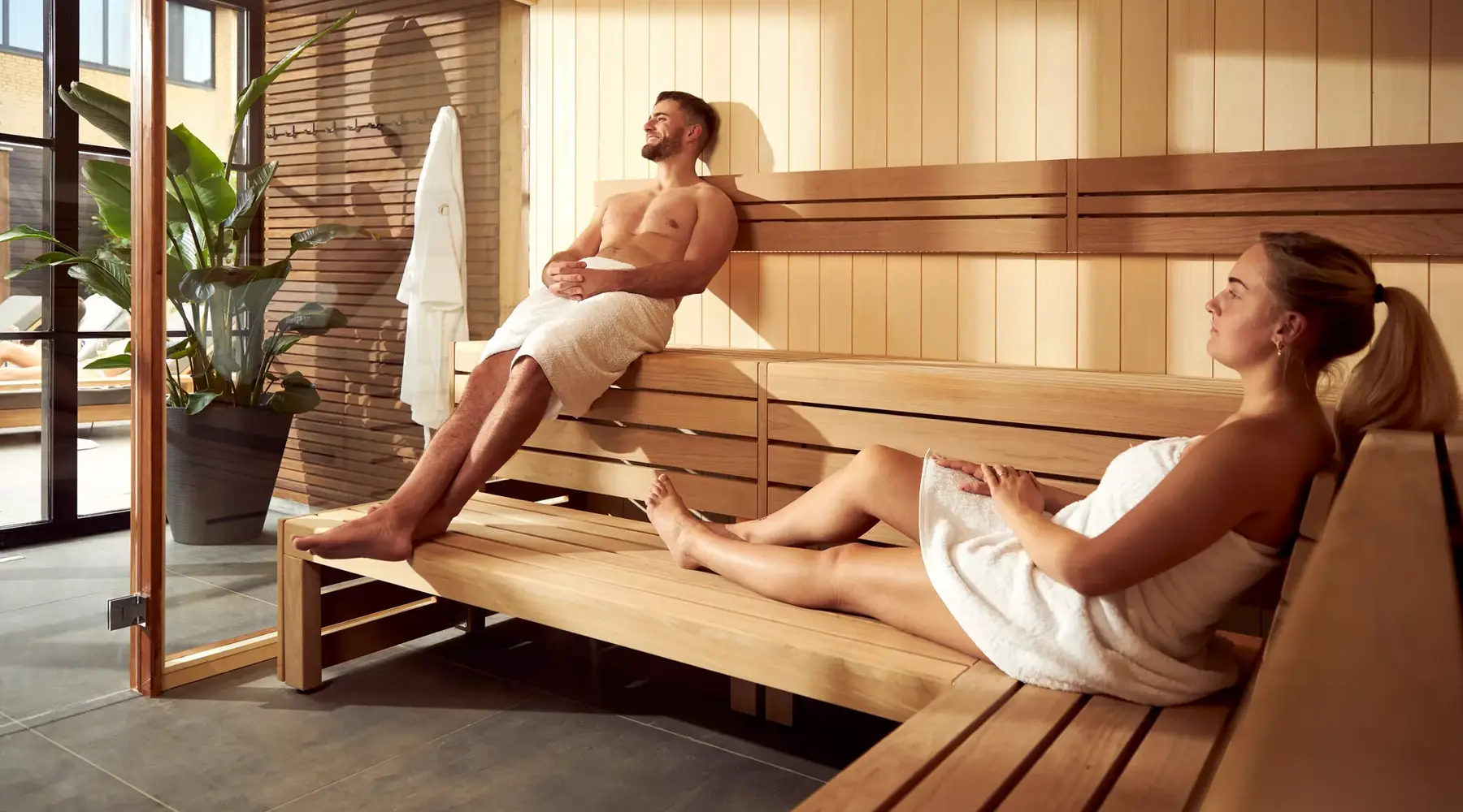 Man and woman in the sauna of a Van der Valk hotel