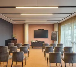 La salle Belfort aménagée pour les présentations d'entreprise à Gand