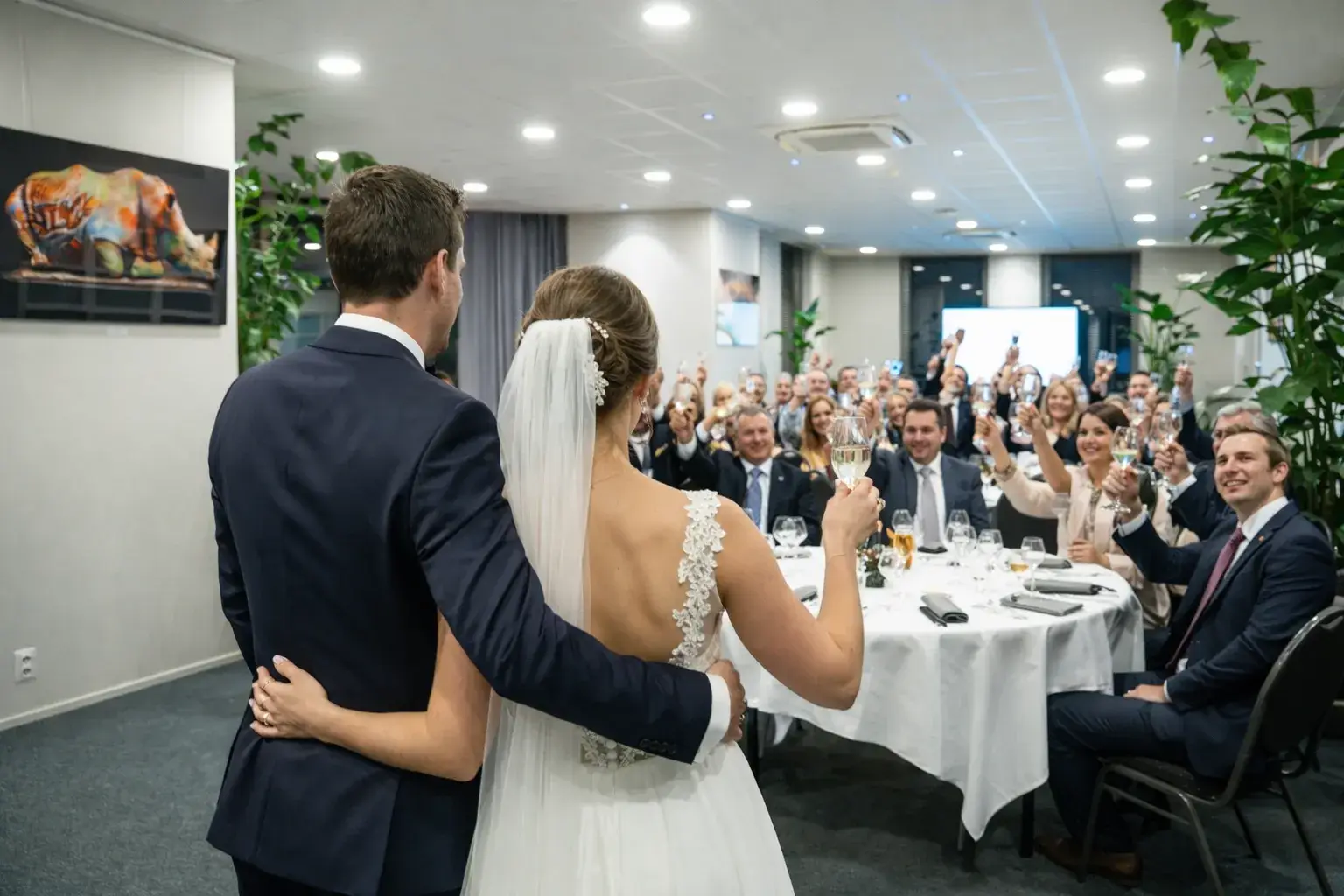 Wedding celebration in the grand reception hall of the Van der Valk Hotel Waterloo.