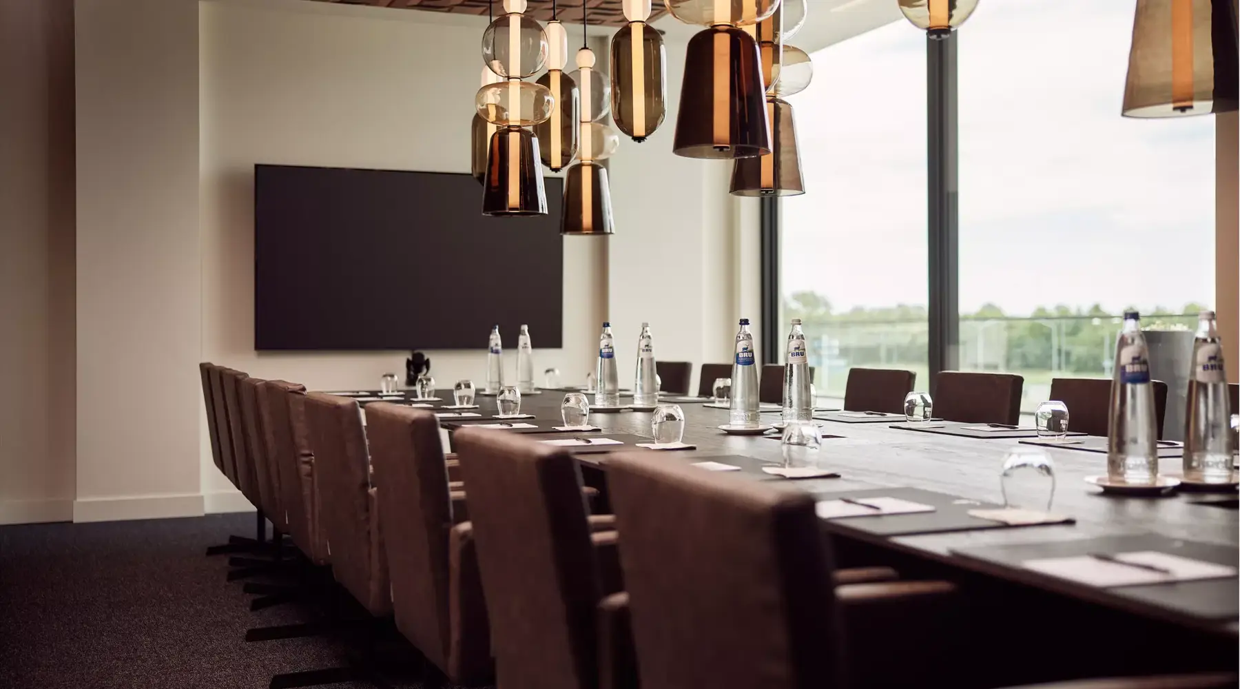 Meeting room at Van der Valk Hotel Nuland – ’s-Hertogenbosch with modern facilities and natural daylight