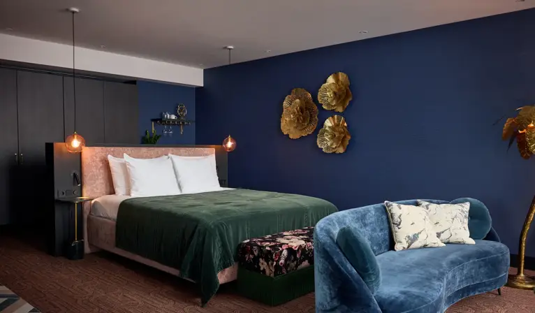 Suite Penthouse Nord avec lit double et coin salon