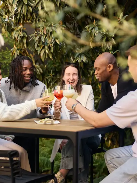 Friends toasting on a terrace