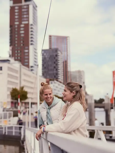 2 girls at the water taxi in Rotterdam