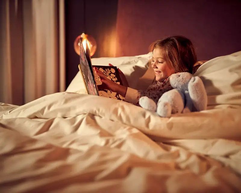 Enfant au lit