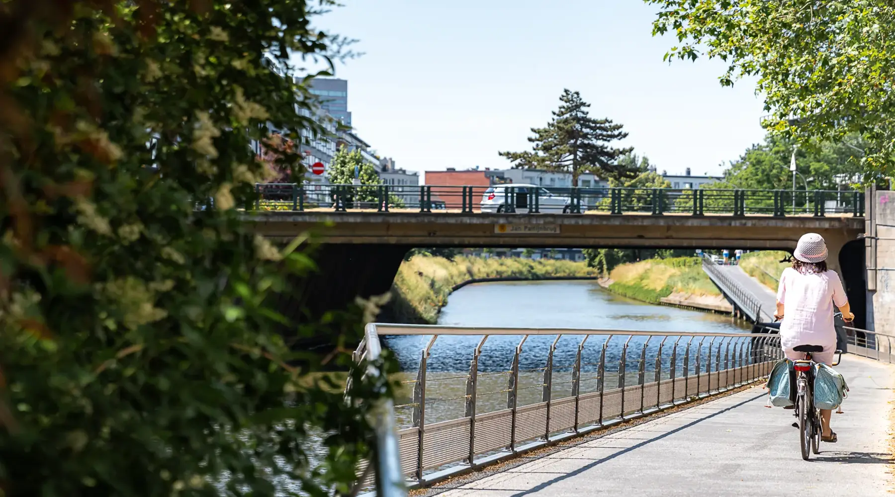 Business trip in Ghent in the spring by bicycle by the water