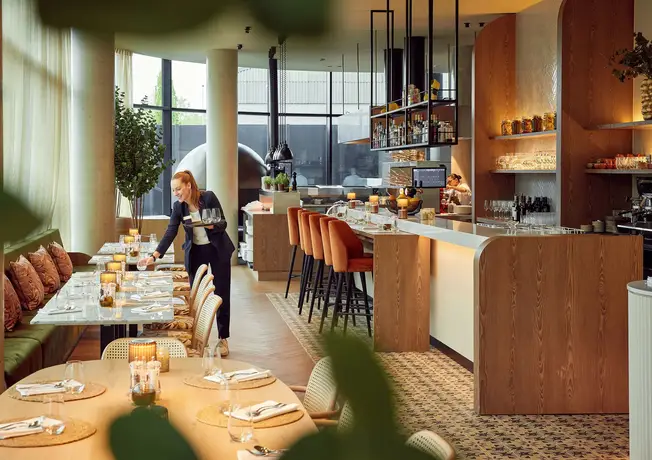 Warme Innenausstattung des Restaurant Limoncello im Hotel Gent