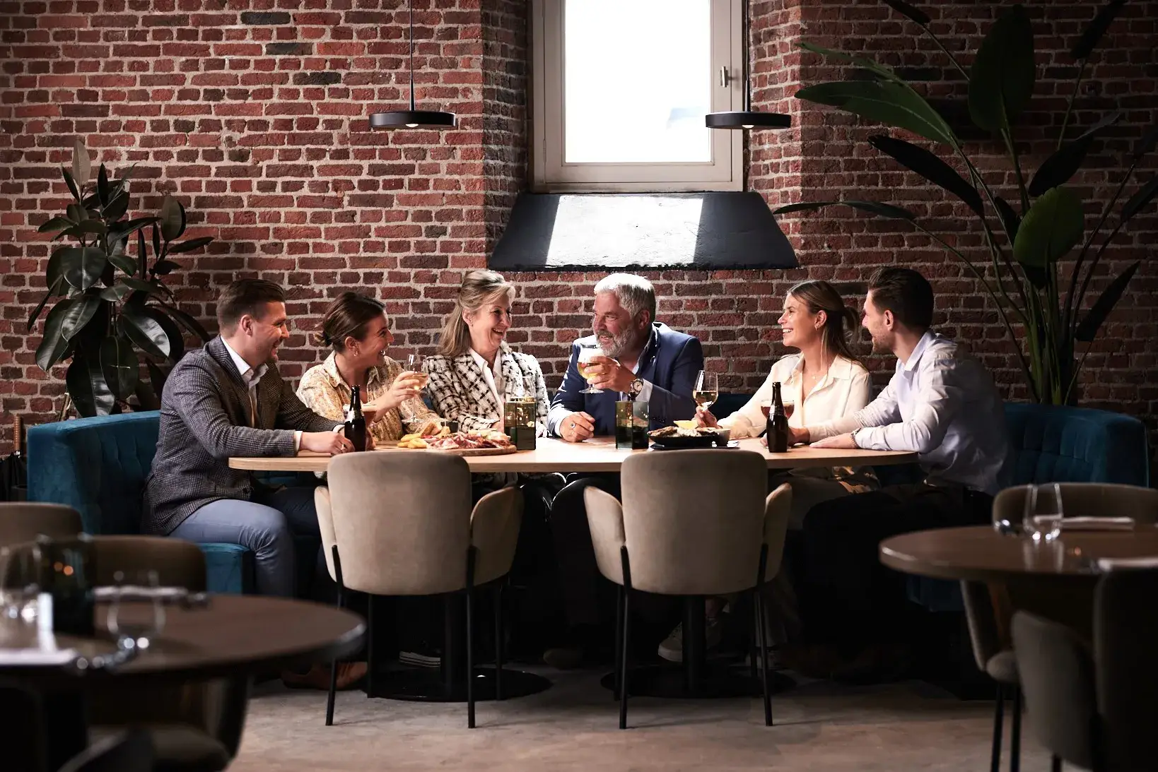 Family Wohrmann at the table in restaurant Ouwen Dok