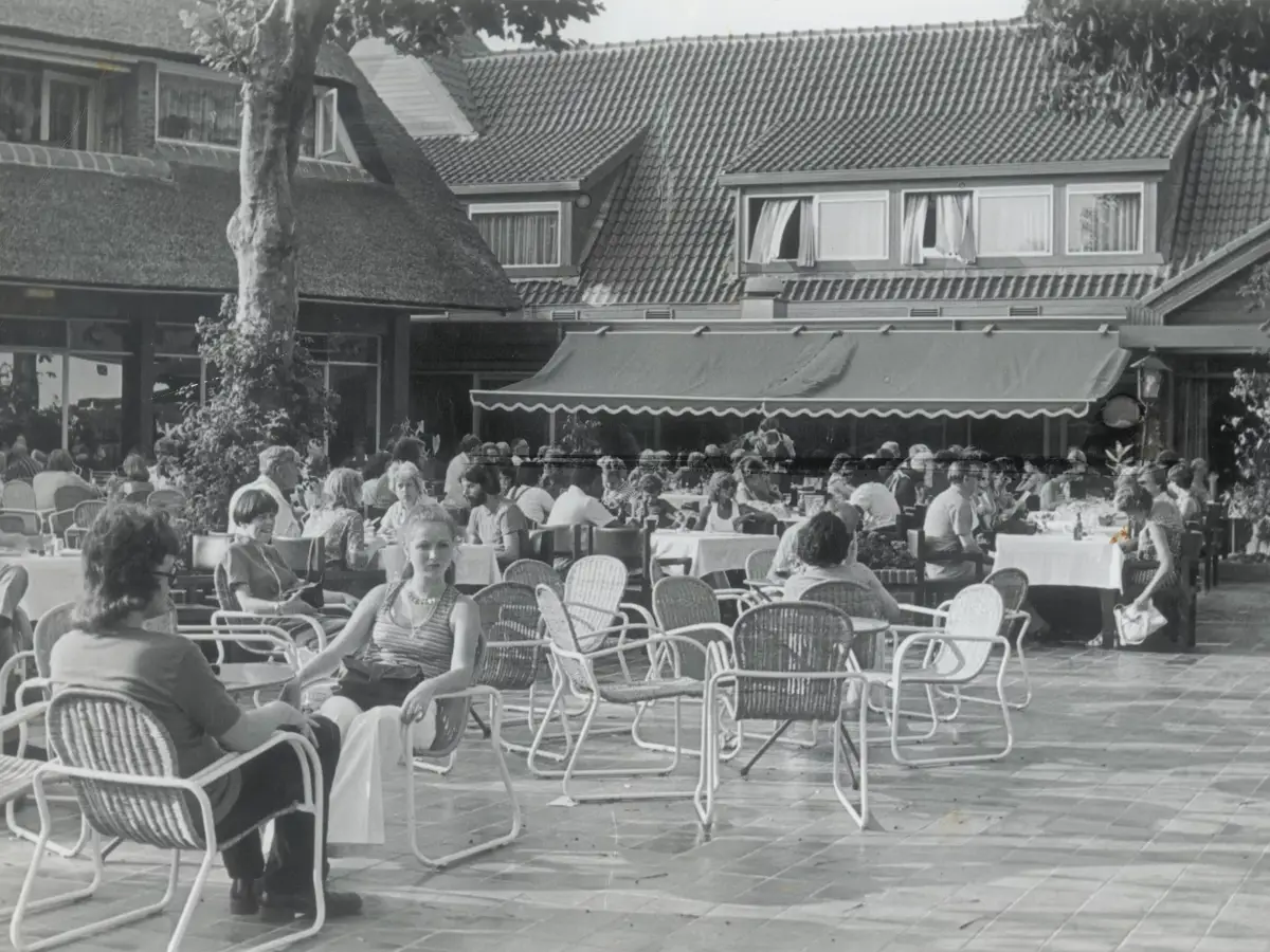 A full terrace at Café De Gouden Leeuw in the past